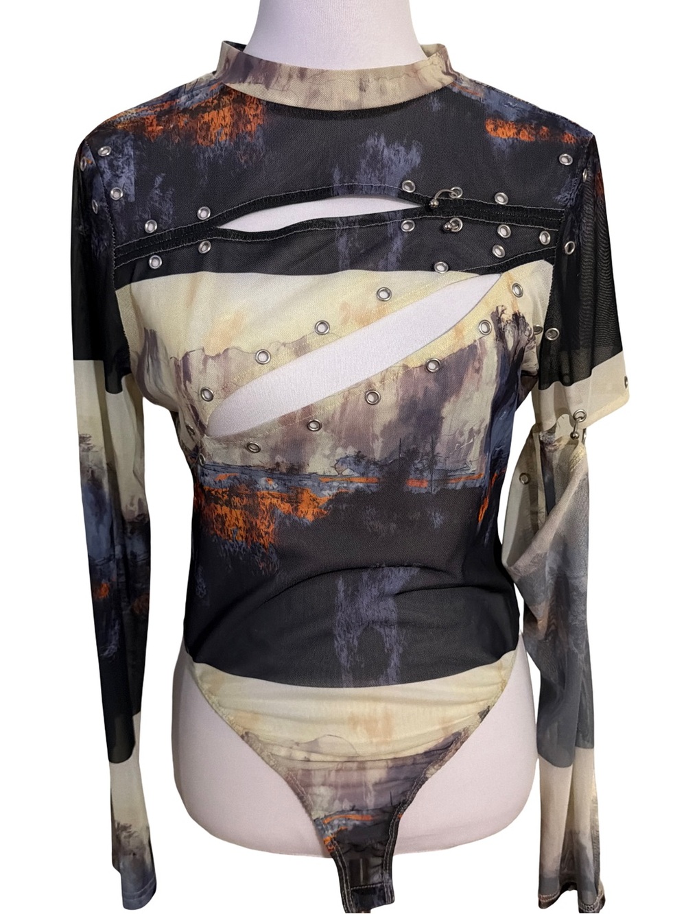 AKIRA Black, Beige & Orange Abstract Cutout Bodysuit with Eyelets